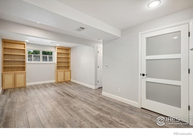 518 Whitmore Ct, Johnstown, CO 80534 - spare room with baseboards, wood finished floors, and recessed lighting