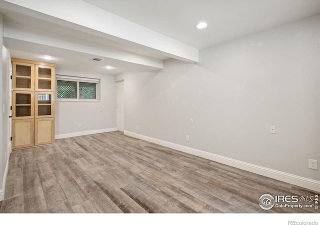518 Whitmore Ct, Johnstown, CO 80534 - basement with wood finished floors, baseboards, and recessed lighting