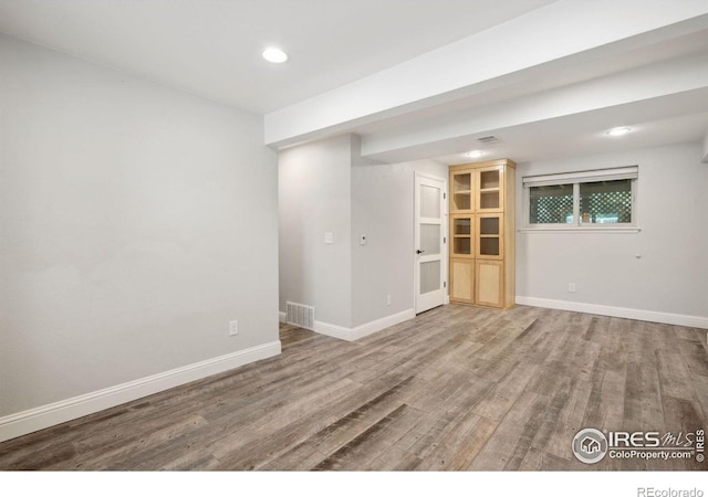 518 Whitmore Ct, Johnstown, CO 80534 - empty room featuring wood finished floors, baseboards, and recessed lighting