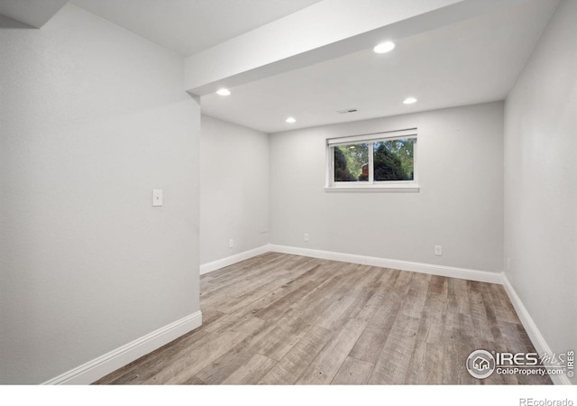 518 Whitmore Ct, Johnstown, CO 80534 - empty room with wood finished floors, recessed lighting, and baseboards
