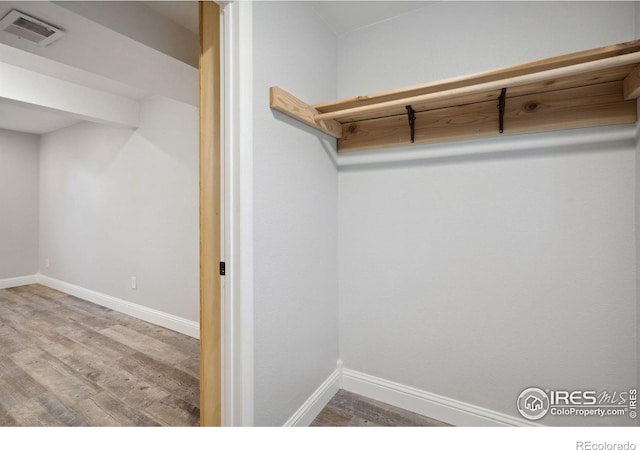518 Whitmore Ct, Johnstown, CO 80534 - walk in closet with wood finished floors