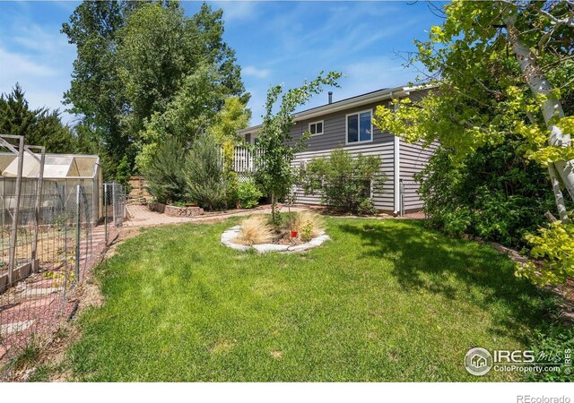518 Whitmore Ct, Johnstown, CO 80534 - view of yard featuring an exterior structure and an outdoor structure