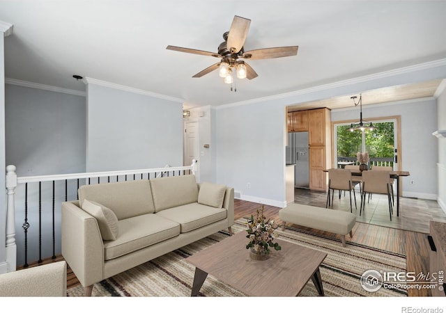 518 Whitmore Ct, Johnstown, CO 80534 - living area with baseboards, crown molding, and ceiling fan