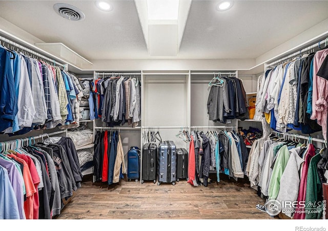 13971 Telluride Dr, Broomfield, CO 80020 - spacious closet featuring wood finished floors