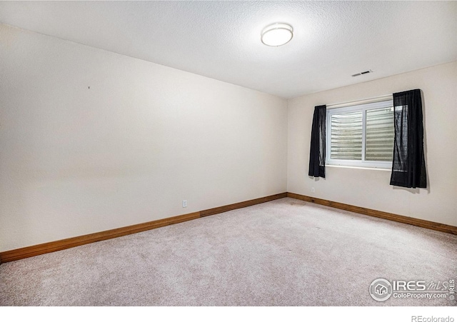 13971 Telluride Dr, Broomfield, CO 80020 - carpeted empty room with baseboards
