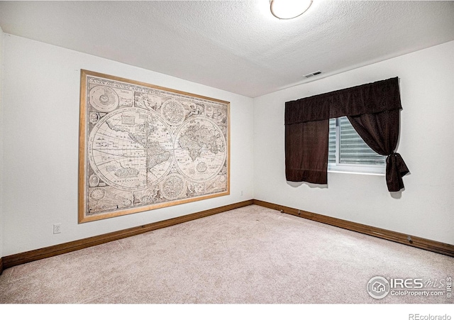 13971 Telluride Dr, Broomfield, CO 80020 - carpeted empty room featuring baseboards and a textured ceiling