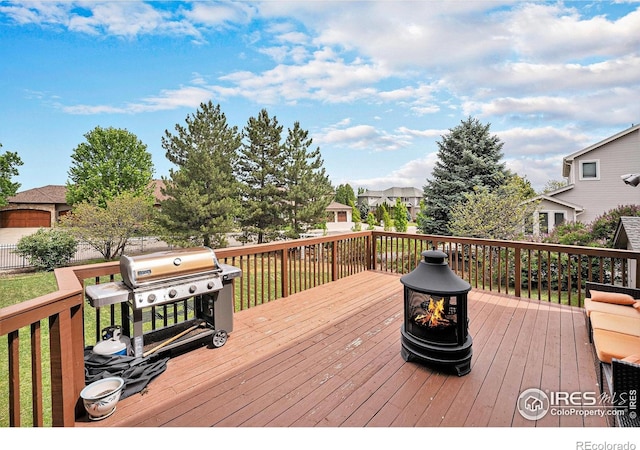 13971 Telluride Dr, Broomfield, CO 80020 - wooden terrace with a grill and a residential view
