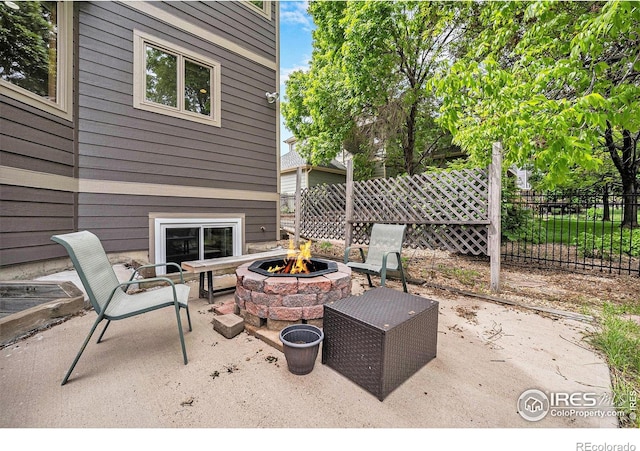 13971 Telluride Dr, Broomfield, CO 80020 - view of patio / terrace featuring an outdoor fire pit