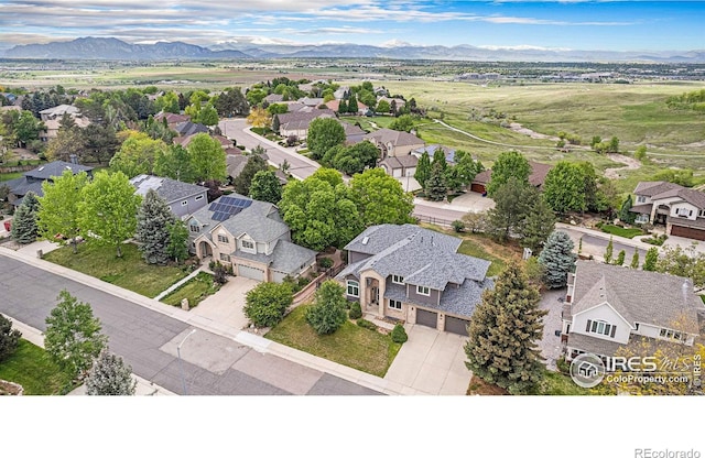 13971 Telluride Dr, Broomfield, CO 80020 - aerial view of residential area featuring mountains