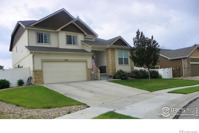 368 Mt Bross Ave, Severance, CO 80550 - craftsman inspired home with stone siding, concrete driveway, and an attached garage