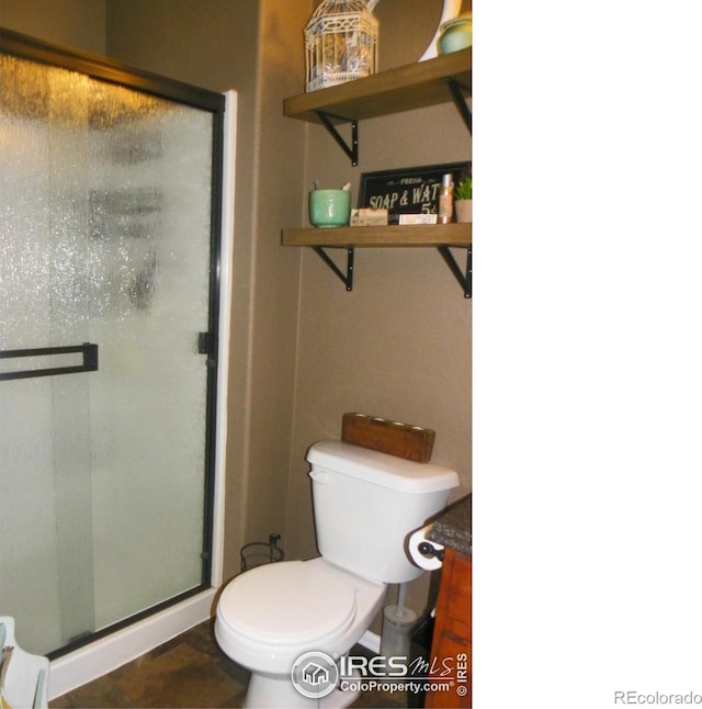 368 Mt Bross Ave, Severance, CO 80550 - bathroom featuring a stall shower and toilet