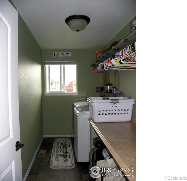 368 Mt Bross Ave, Severance, CO 80550 - laundry area with washer and clothes dryer and baseboards