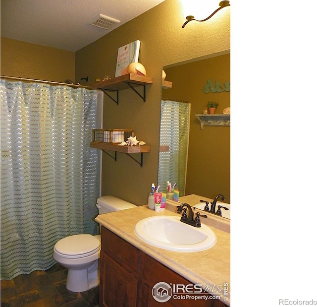 368 Mt Bross Ave, Severance, CO 80550 - full bathroom with vanity, toilet, and a shower with shower curtain