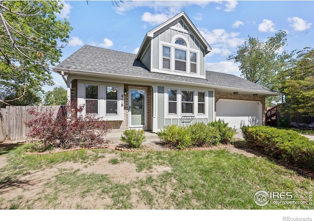 4118 Dillon Way, Fort Collins, CO 80526 - view of front of home featuring an attached garage, roof with shingles, and board and batten siding