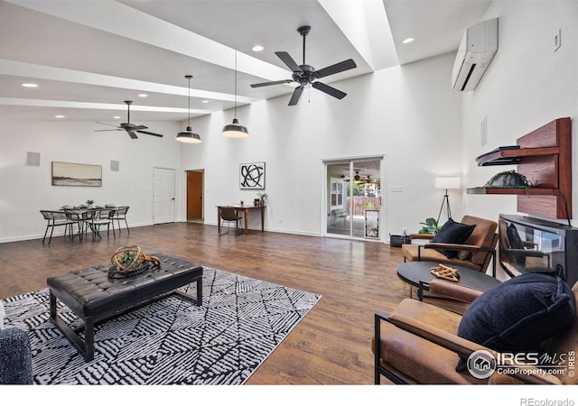 4118 Dillon Way, Fort Collins, CO 80526 - living room featuring a ceiling fan, a wall mounted air conditioner, recessed lighting, wood finished floors, and baseboards