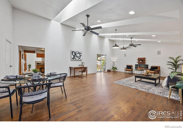 4118 Dillon Way, Fort Collins, CO 80526 - dining space with a ceiling fan, recessed lighting, high vaulted ceiling, wood finished floors, and baseboards