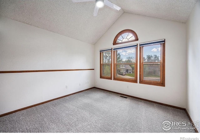 4118 Dillon Way, Fort Collins, CO 80526 - carpeted spare room featuring a ceiling fan, baseboards, lofted ceiling, and a textured ceiling