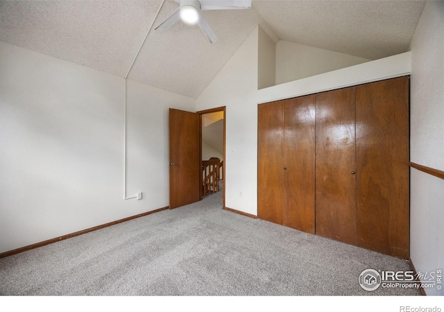 4118 Dillon Way, Fort Collins, CO 80526 - unfurnished bedroom featuring carpet, lofted ceiling, a closet, a textured ceiling, and ceiling fan