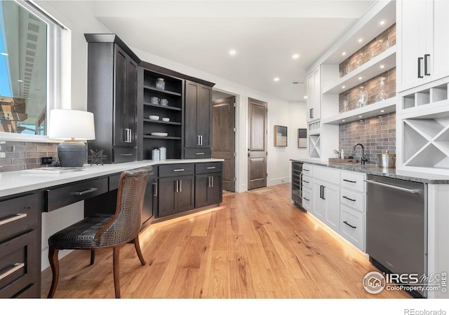 2387 Harding Park Ct, Berthoud, CO 80513 - kitchen featuring open shelves, stainless steel dishwasher, wine cooler, decorative backsplash, and a sink