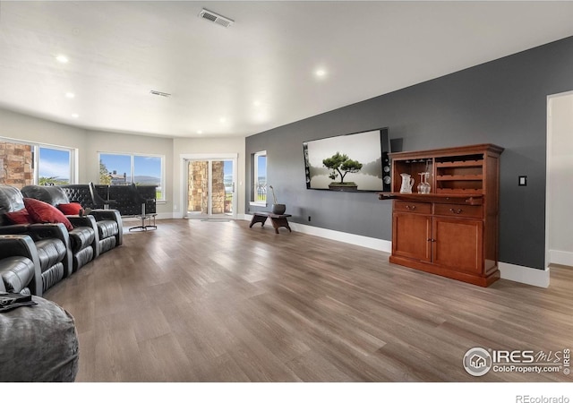 2387 Harding Park Ct, Berthoud, CO 80513 - living area with baseboards, light wood-style floors, and recessed lighting