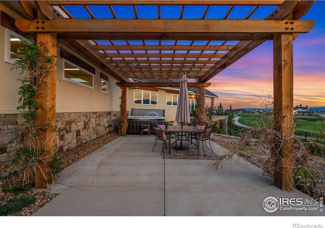 2387 Harding Park Ct, Berthoud, CO 80513 - view of patio with outdoor dining area, a pergola, and a hot tub