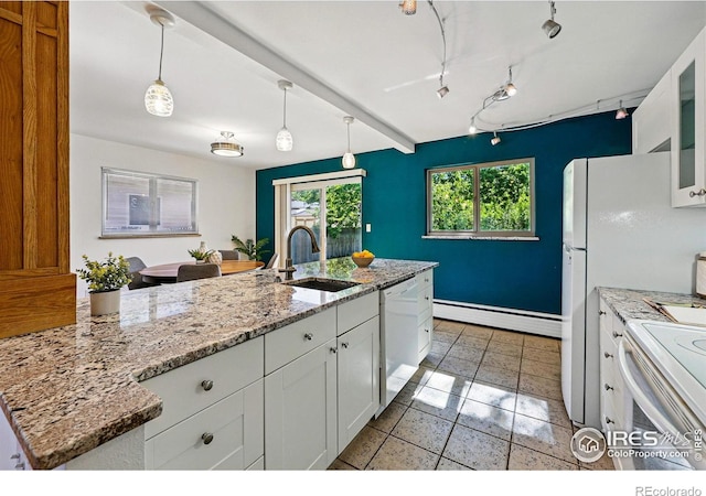 325 Colgate St, Boulder, CO 80305 - kitchen with a baseboard heating unit, a sink, white appliances, and white cabinetry