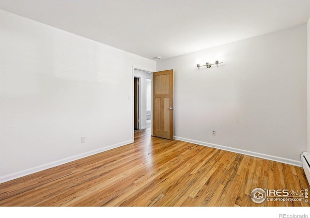 325 Colgate St, Boulder, CO 80305 - empty room featuring light wood finished floors and baseboards
