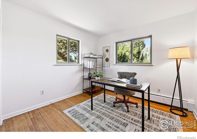 325 Colgate St, Boulder, CO 80305 - office featuring healthy amount of natural light, baseboards, and wood finished floors
