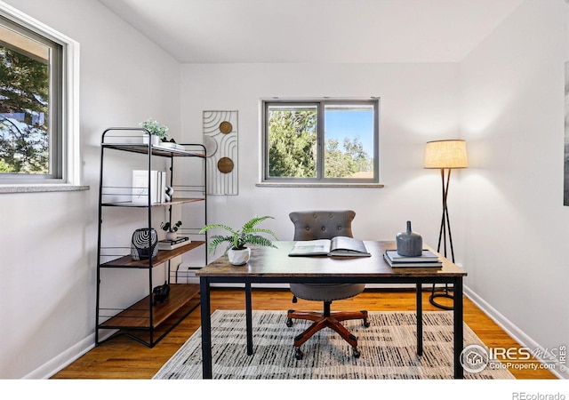 325 Colgate St, Boulder, CO 80305 - office area with baseboards and wood finished floors