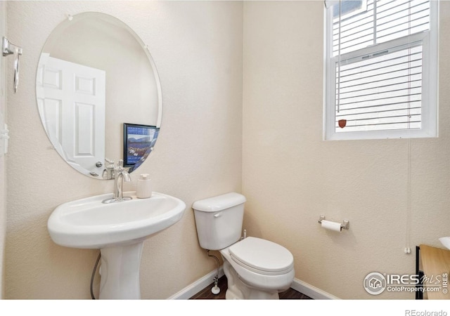 2320 Clipper Way, Fort Collins, CO 80524 - bathroom with toilet and baseboards