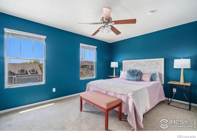 2320 Clipper Way, Fort Collins, CO 80524 - bedroom with carpet flooring, baseboards, and a ceiling fan