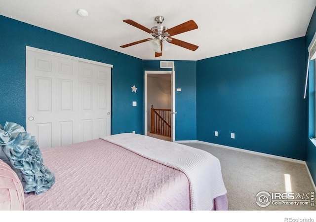 2320 Clipper Way, Fort Collins, CO 80524 - carpeted bedroom with a closet, ceiling fan, and baseboards