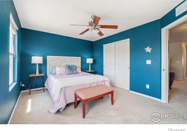 2320 Clipper Way, Fort Collins, CO 80524 - carpeted bedroom featuring a closet, baseboards, and ceiling fan