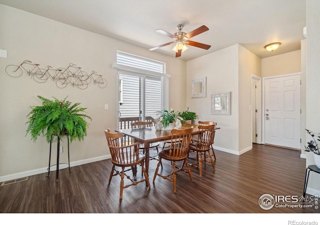 2320 Clipper Way, Fort Collins, CO 80524 - dining room with dark wood-style floors, a ceiling fan, and baseboards