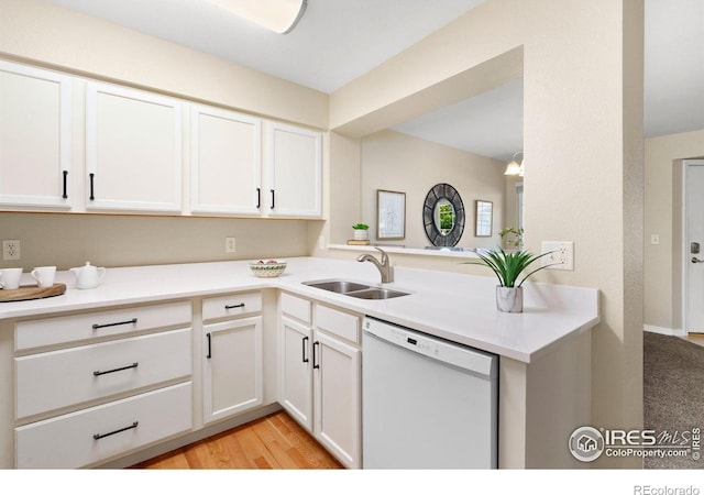 5551 Cornerstone Dr Unit 26, Fort Collins, CO 80528 - kitchen with dishwasher, a sink, white cabinets, and light countertops