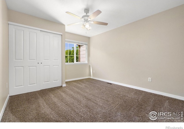 5551 Cornerstone Dr Unit 26, Fort Collins, CO 80528 - unfurnished bedroom featuring carpet flooring, baseboards, a closet, and a ceiling fan