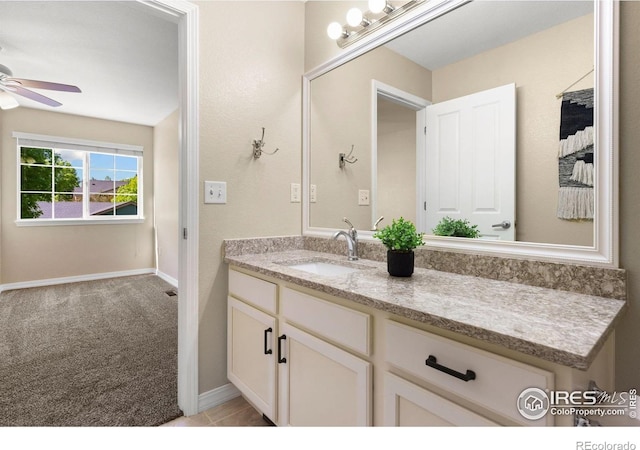 5551 Cornerstone Dr Unit 26, Fort Collins, CO 80528 - bathroom with a ceiling fan, vanity, and baseboards