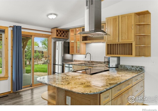 1805 Kinnikinnik Pl, Loveland, CO 80537 - kitchen with island exhaust hood, stainless steel appliances, open shelves, a sink, and vaulted ceiling
