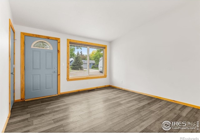 1805 Kinnikinnik Pl, Loveland, CO 80537 - foyer with wood finished floors and baseboards