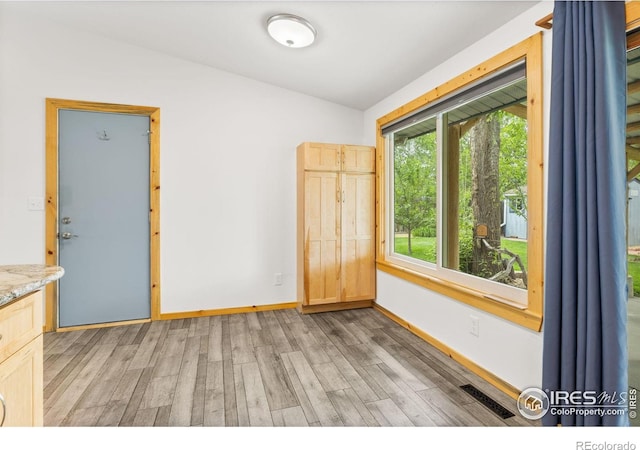 1805 Kinnikinnik Pl, Loveland, CO 80537 - unfurnished room with light wood-type flooring and baseboards