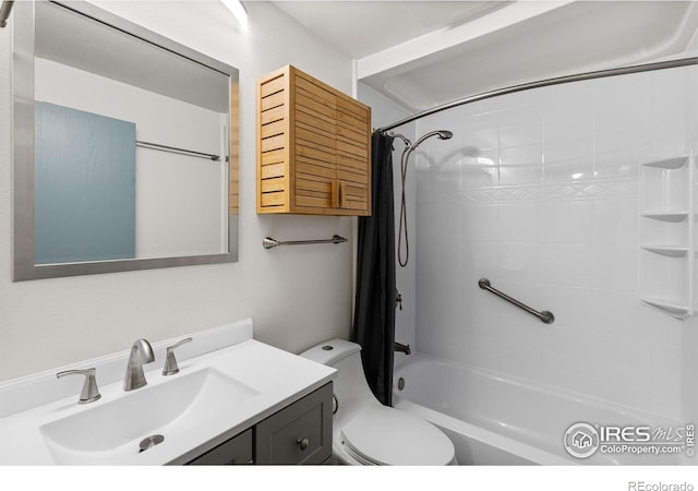 1805 Kinnikinnik Pl, Loveland, CO 80537 - bathroom with toilet, vanity, and shower / bath combo with shower curtain