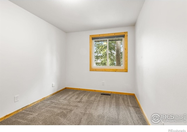 1805 Kinnikinnik Pl, Loveland, CO 80537 - empty room with baseboards and carpet floors