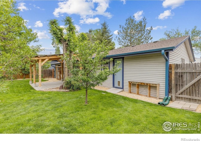 1805 Kinnikinnik Pl, Loveland, CO 80537 - rear view of house with a patio and roof with shingles