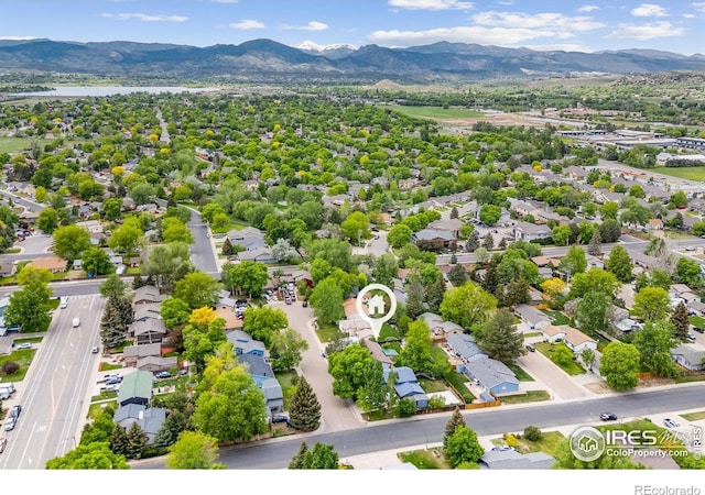 1805 Kinnikinnik Pl, Loveland, CO 80537 - aerial perspective of suburban area featuring a mountainous background