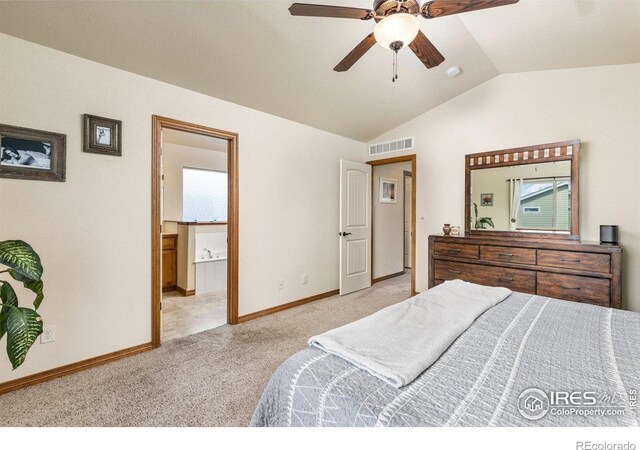 6848 Pettigrew St, Wellington, CO 80549 - carpeted bedroom with vaulted ceiling, connected bathroom, baseboards, and a ceiling fan