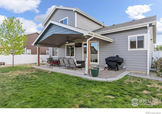 6848 Pettigrew St, Wellington, CO 80549 - back of property with ceiling fan, a patio area, and outdoor lounge area