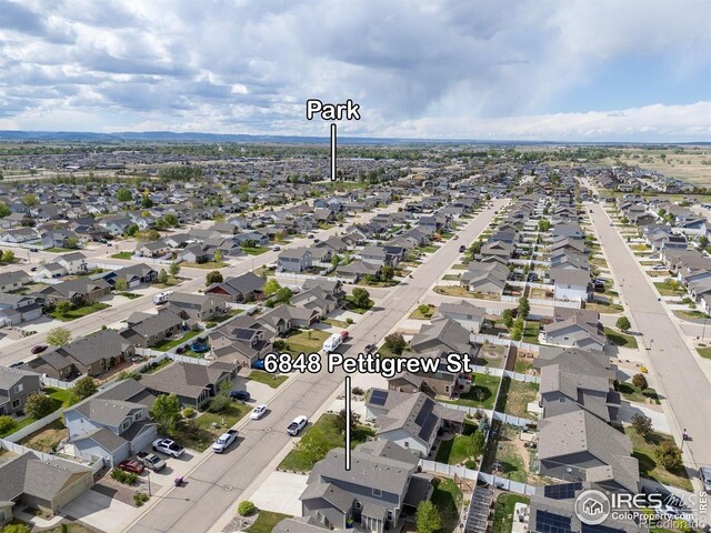6848 Pettigrew St, Wellington, CO 80549 - aerial perspective of suburban area