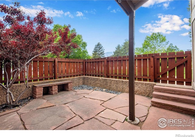 4795 Tantra Dr, Boulder, CO 80305 - fenced backyard with a patio