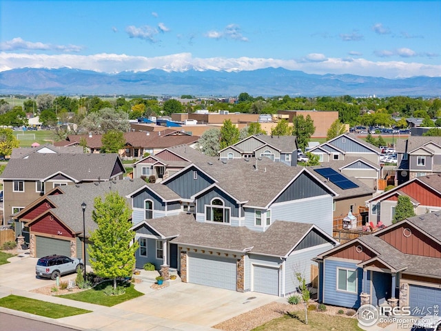6681 6th St, Frederick, CO 80530 - aerial perspective of suburban area with mountains