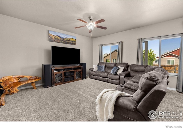 6681 6th St, Frederick, CO 80530 - carpeted living room with ceiling fan and baseboards